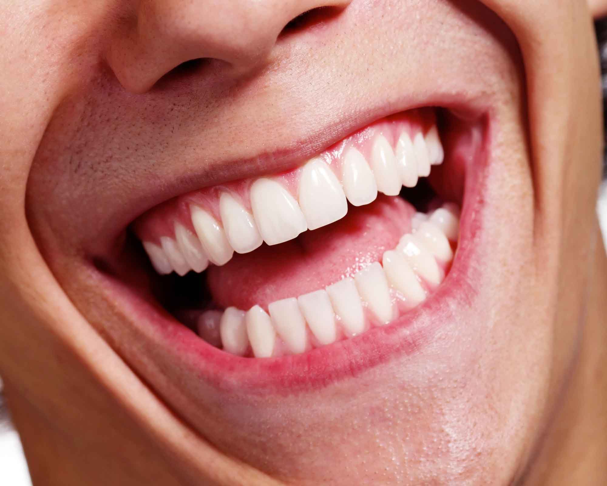 Самый большой зуб в мире у человека фото
